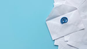 Email marketing concept. An open white envelope and email address