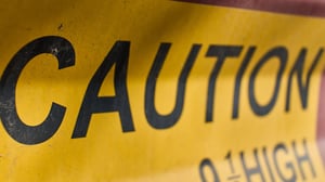 Warning sign indicating hazard area in construction zone