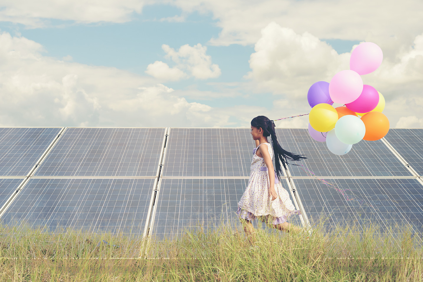 Child-with-future-of-alternative-energy-and-sustainable-energy.